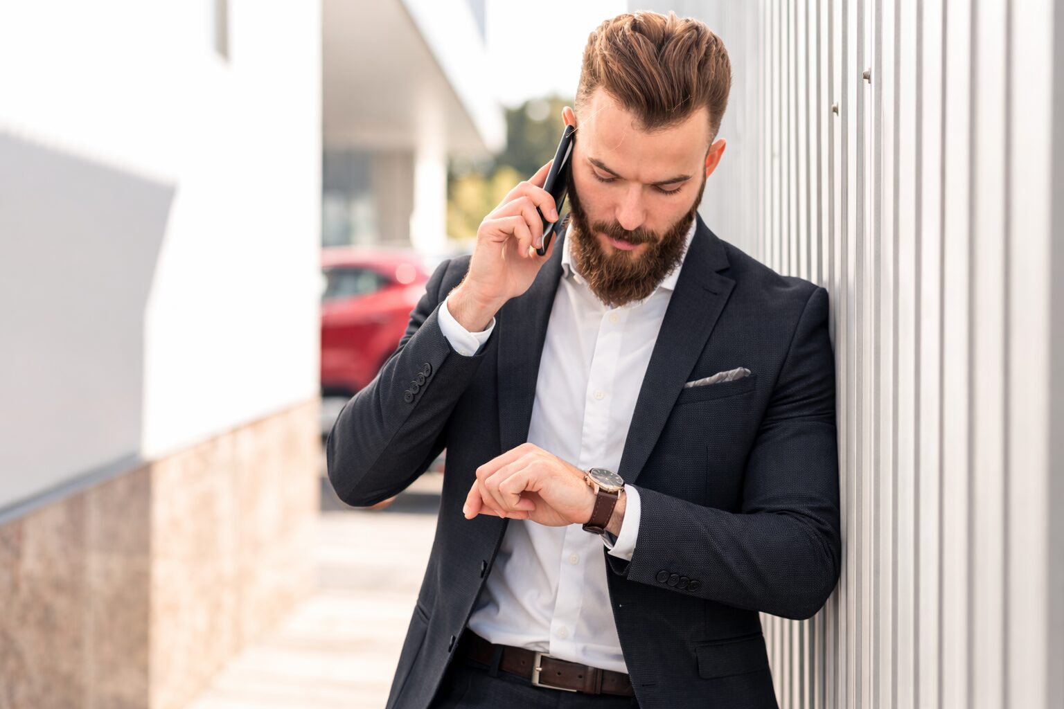 bearded man watching watch - discipline worker